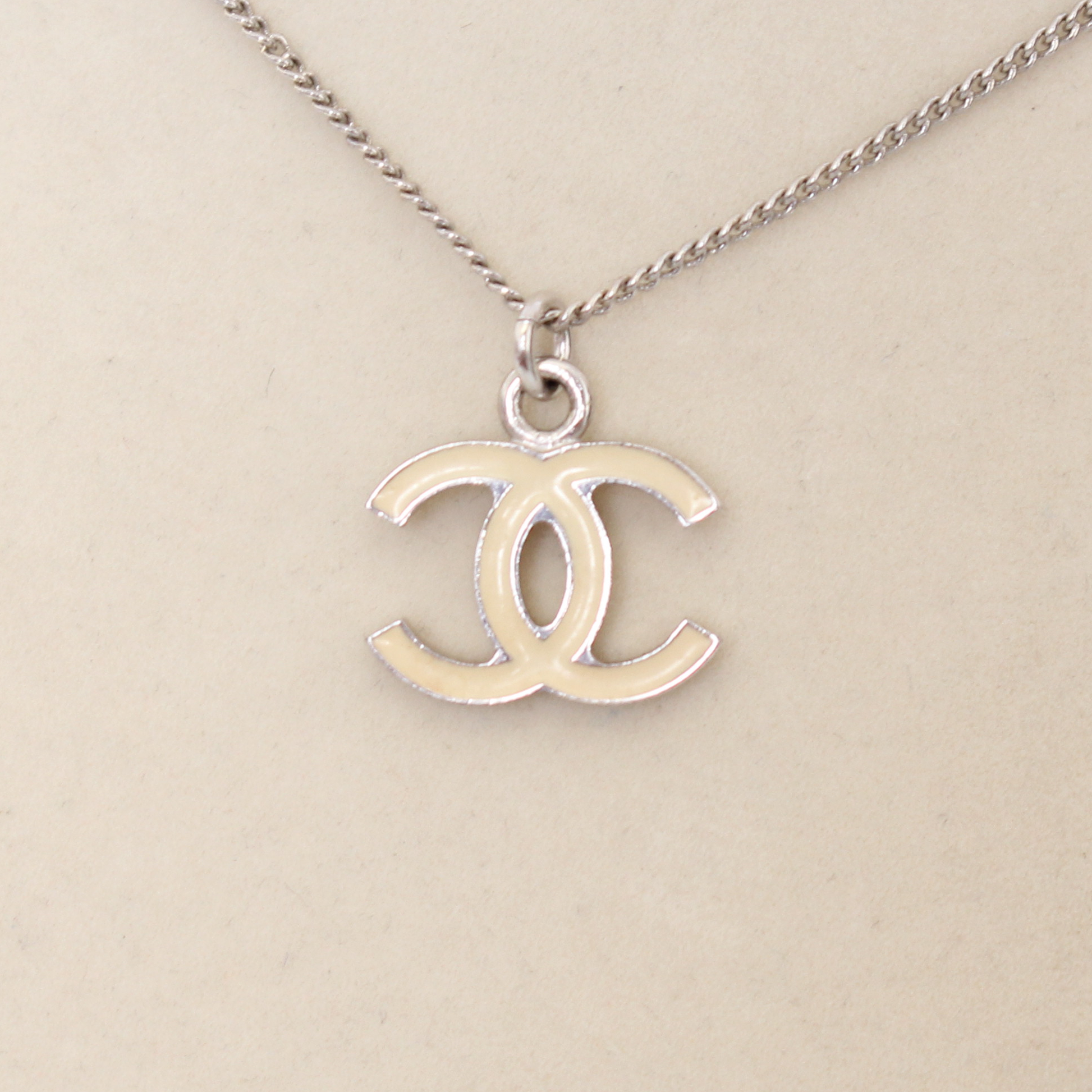 Chanel CC Cream Enamel Pendant