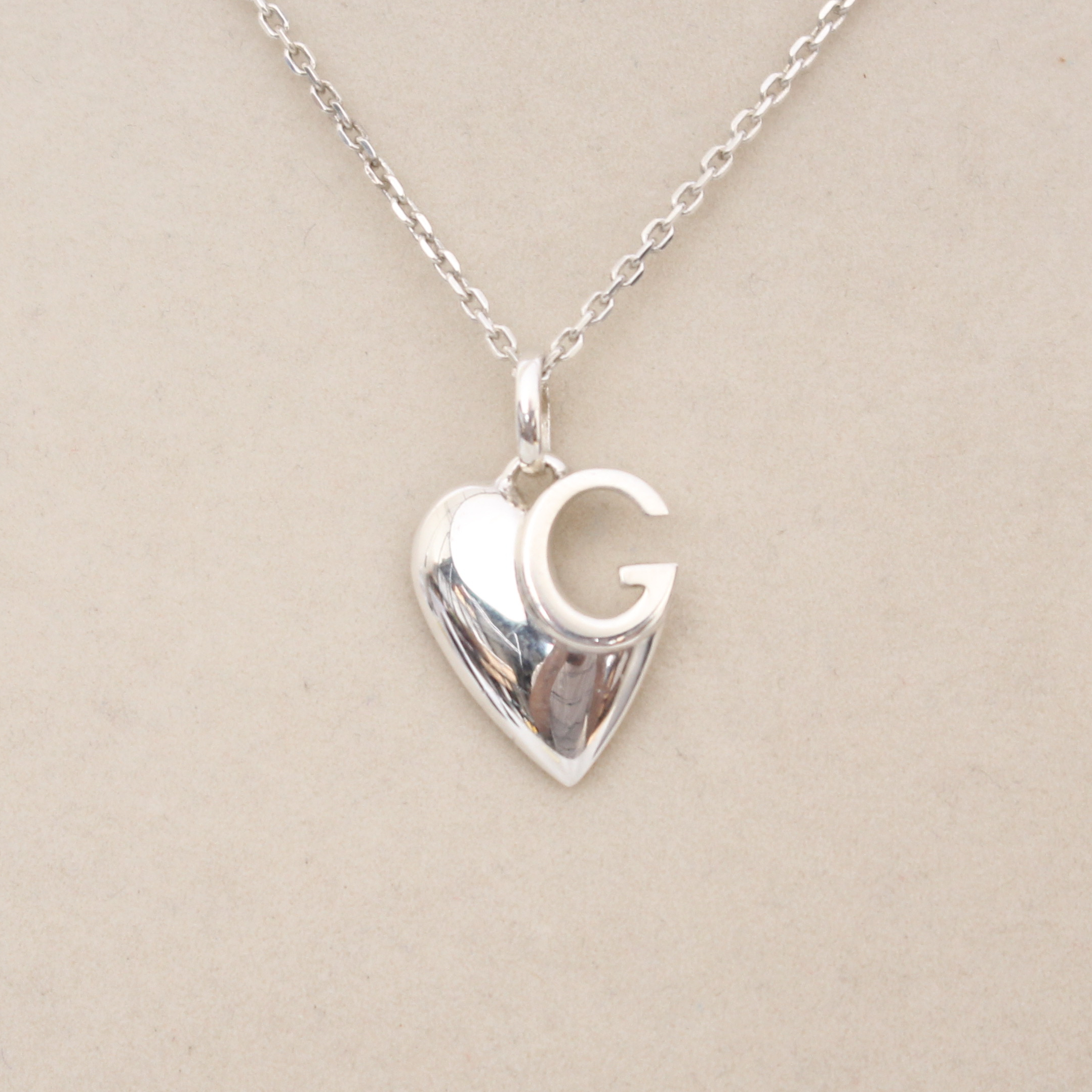 Gucci Heart Logo Pendant