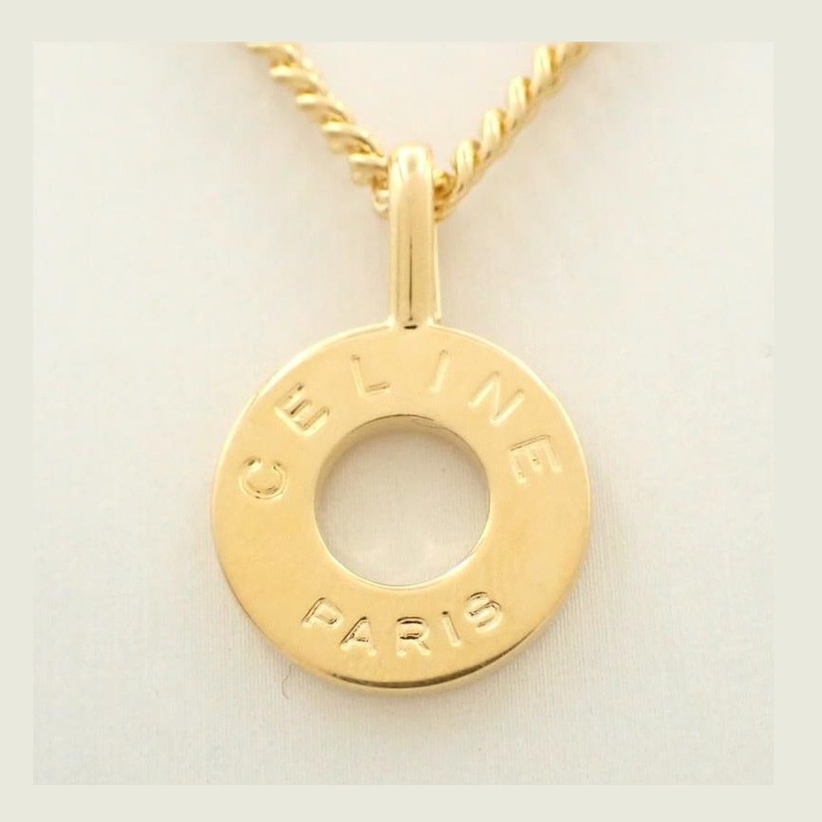 Celine Engraved Circle Pendant